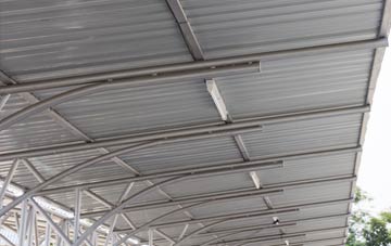 installing Tram Inn metal roofing